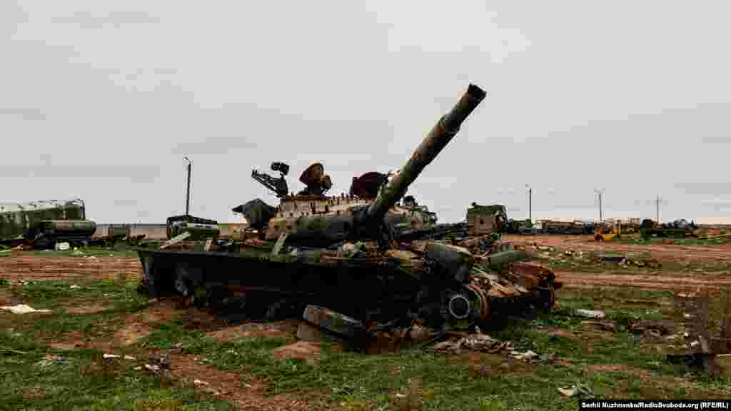 A destroyed tank in the territory of the airport. 
