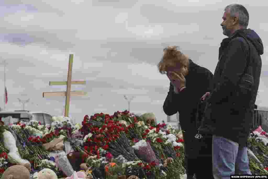 Russian officials have said 11 people have been detained in connection with the March 22 attack on the concert venue in the Moscow suburb of Krasnogorsk, including four Tajik nationals who are suspected of having carried out the attack.