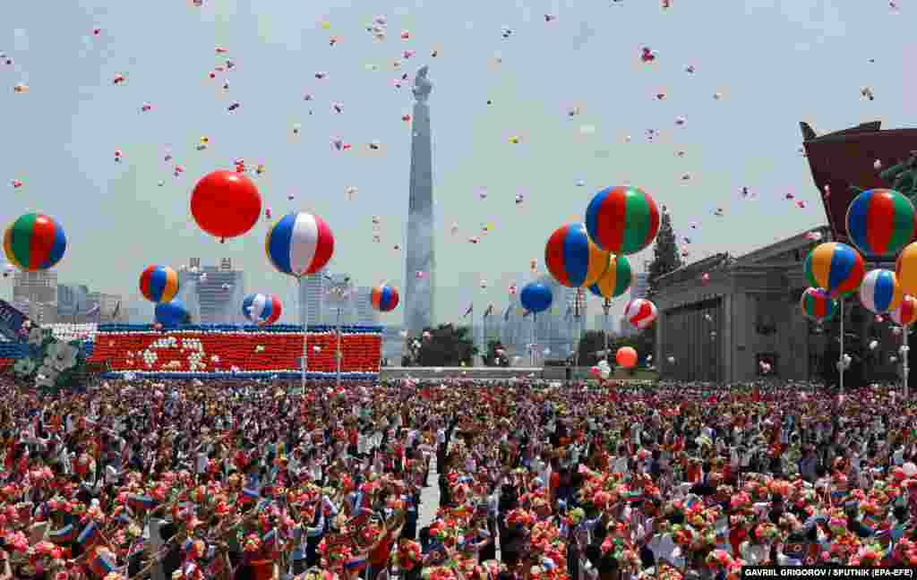 North Koreans attend a welcoming ceremony for Putin in Pyongyang on June 19. &quot;We highly appreciate your consistent and unwavering support for Russian policy, including in the Ukrainian direction,&quot; Putin told Kim at the start of their talks, according to Russian media.