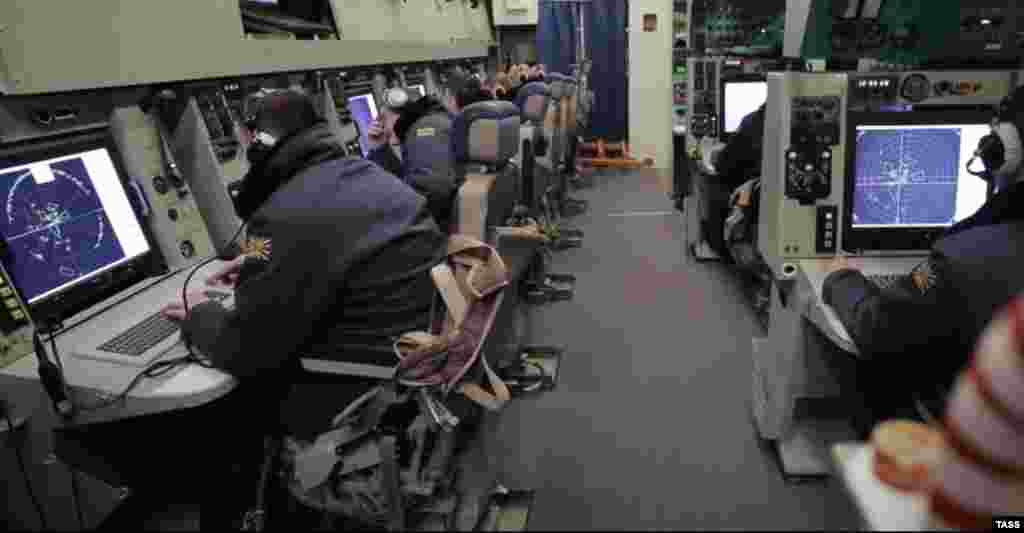 Radar officers inside an A-50 during a training flight. The surveillance planes are a highly valuable target due to their cost -- up to half a billion dollars per aircraft -- and the real-time situational awareness they provide to the Russian war machine. The aircraft serves as a kind of airborne “control tower" with 360 degree radar capable of tracking and identifying aircraft or ships from hundreds of kilometers away. 