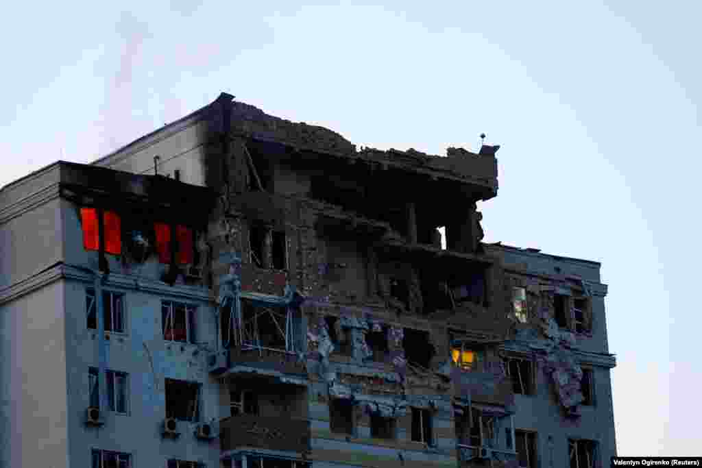 A burning apartment building damaged during the drone strike in Kyiv.
