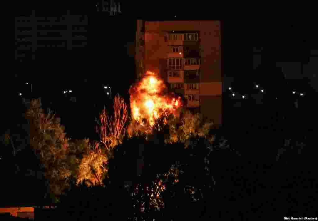 A Russian drone explodes as it strikes a building in Kyiv early on July 13. At least one person died and several were injured in an overnight Russian drone attack on Ukraine&#39;s capital, authorities said.
