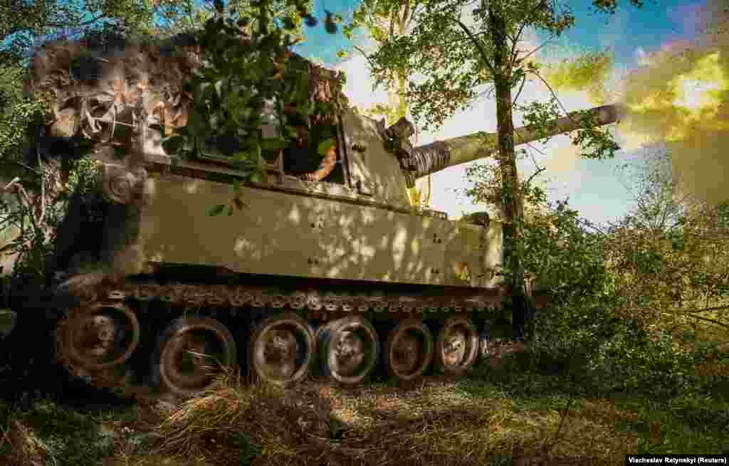 Ukrainian soldiers fire a M109 self-propelled howitzer toward Russian positions. At a speech in Washington on June 30, the chairman of the U.S. joint chiefs of staff defended Ukraine's progress. "That it's going slower than people predicted doesn't surprise me at all," General Mark Milley said. 