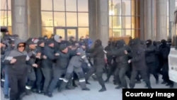 Oil workers protest in Astana, Kazakhstan, on April 11.