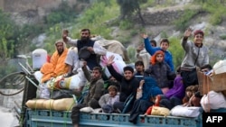 برخی از خانواده های افغان که مجبور شده اند پاکستان را ترک کنند