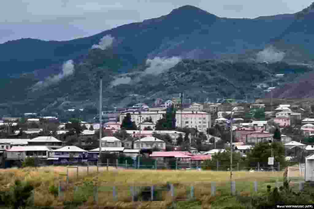 Smoke rises from artillery strikes on a hilltop outside Stepanakert. The UN Security Council scheduled an emergency meeting for September 21 as the international community sought ways to avoid an intensification of a long-running conflict that has already sparked two intense wars between the post-Soviet Caucasus neighbors.