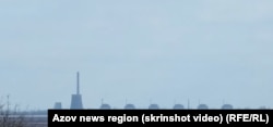 Вид з Нікополя на окупований Енергодар та Запорізьку АЕС, березень 2024 рік