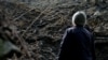 Sipovo, Bosnia and Herzegovina, Woman looking in mining