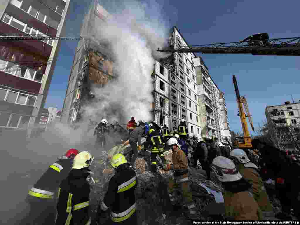Rescuers worked throughout the morning in Uman in hopes of finding survivors who are still trapped in the rubble. On Twitter, Ukrainian President Volodymyr Zelenskiy condemned the strikes, calling the attacks a "night of Russian terror."