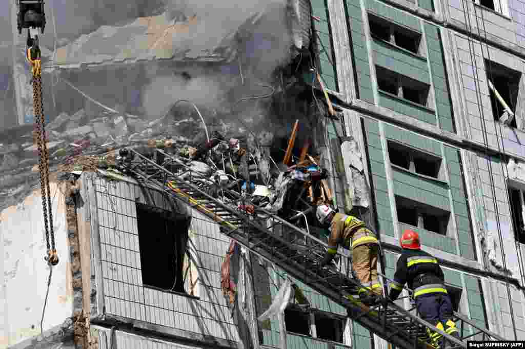 Firefighters at a residential building in Uman. The missiles were fired from aircraft operating in the Caspian Sea region, according to Ukrainian Armed Forces Commander in Chief Valeriy Zaluzhniy. 