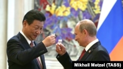Очільник КНР Сі Цзіньпін і президент Росії Володимир Путін. Китай, 2015 рік 