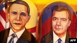 Likenesses of U.S. President Barack Obama (left) and his Russian counterpart, Dmitry Medvedev, on nesting dolls in Moscow