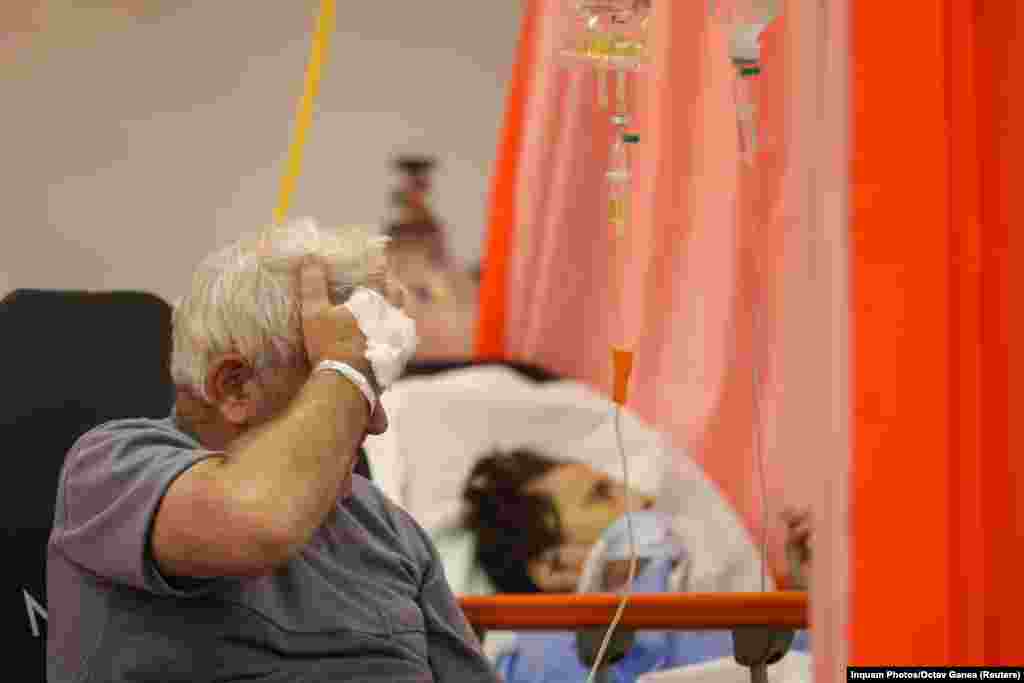 Coronavirus patients in the intensive-care unit of the Bagdasar-Arseni Hospital in Bucharest on October 19. Intensive-care doctor Claudiu Rusu told Reuters on October 19 that hospitals in the capital were stretched beyond capacity. "There isn't enough room to take all the cases that need us," he said.