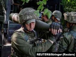 Підготовка до стрільби артилерійського розрахунку гаубиці M777
