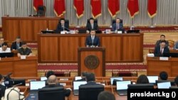 Kyrgyz President Sadyr Japarov peaks in parliament in June.