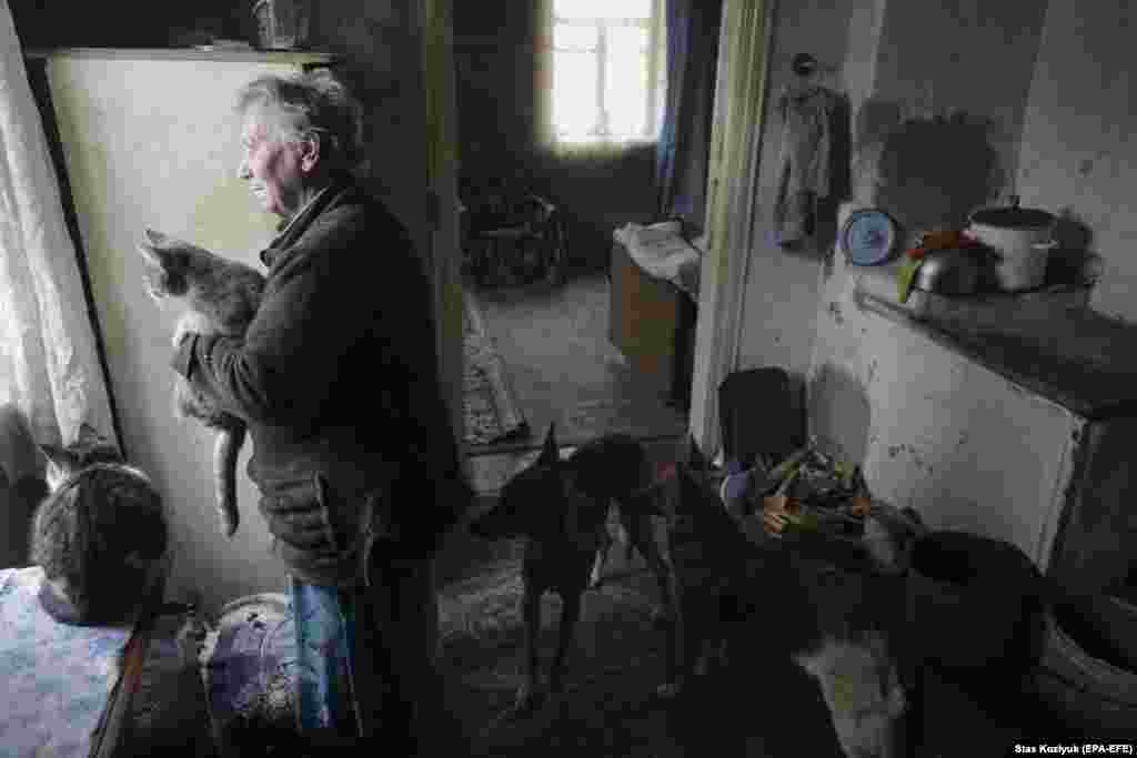 Natalya, a resident of Avdiyivka, inside her home a few kilometers from the front lines on January 26. She was severely injured during fighting in January 2017.&nbsp;