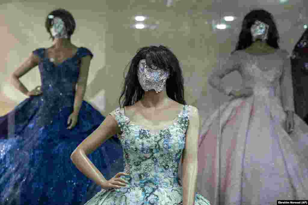Another shop owner, Hakim, shaped aluminum foil over his mannequins’ heads. “I made an opportunity out of this threat and ban and did it so the mannequins are even more attractive than before,” he said. 