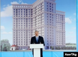 A sign on the apartment building -- located in the Bibiheybat settlement of Baku -- quotes President Ilham Aliyev as saying: "It’s a great honor to be a friend of journalists."