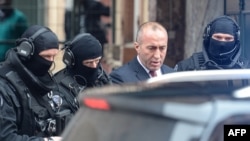Former Kosovo Prime Minister Ramush Haradinaj leaves the prison of Colmar surrounded by police officers on January 12.