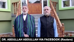 عبدالله عبدالله رئیس پیشین شورای عالی مصالحه ملی در نظام جمهوری و حامد کرزی رئیس جمهور پیشین افغانستان