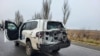 Пошкоджений ударом безпілотника броньований автомобіль моніторингової місії МАГАТЕ на ЗАЕС