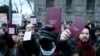 Studenti drže indekse na protestu ispred zgrade Ustavnog suda u Beogradu, 12. januar 2025.
