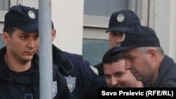 Duško Šarić u pratnji policije, 13. mja 2011