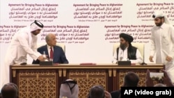  توافقنامۀ دوحه در ۲۹ فبروری ۲۰۲۰ توسط زلمی خلیلزاد، نمایندۀ ویژۀ پیشین وزارت خارجۀ امریکا در امور صلح افغانستان و ملا عبدالغنی برادر، رئیس دفتر سیاسی آن زمان طالبان در قطر امضا شد.
