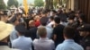 Some 100 people rallied in front of courthouse, protesting the court's ruling.