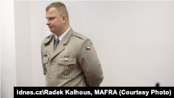 Erik Estu said he bought the uniform in a local store because he collects military items.