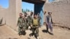 More Than 20 Afghans Killed, Wounded In Taliban Attacks
