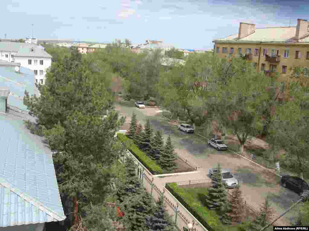 A view from above street level of the leafy area around the security facility (roof at left) apparently targeted in the May 17 attack.