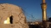 Shrine City Rises From The Rubble -- Slowly
