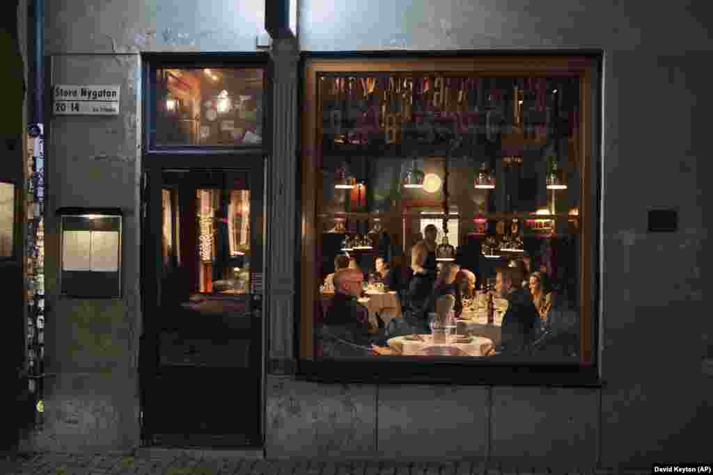 A busy restaurant in Stockholm on March 25 Other countries, including Britain, initially favored a similar approach to Sweden before sharply changing course when death rates from the pandemic spiked.