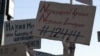 Плакати під час акції протесту у Запоріжжі 23 липня 2025 року 
