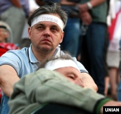 Журналіст Сергій Рахманін на акції біля Українського дому під час «Мовного Майдану» з вимогою скасувати так званий «закон Ківалова-Колесніченка». Київ, 4 липня 2012 року