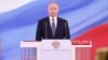 RUSSIA - Vladimir Putin (C) is sworn as Russian President, with Chairman of the Constitutional Court Valery Zorkin (L) and Chairwoman of the Federation Council Valentina Matviyenko seen nearby, during an inauguration ceremony at the Kremlin in Moscow, Rus