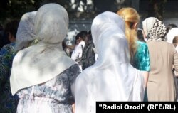 Tajik girls wear the hijab in Dushanbe.