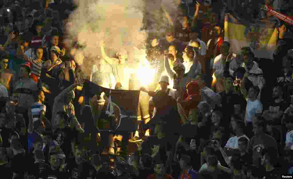 Serbian emotions were high, with fans burning&nbsp;a NATO flag in the stands during the action. As a precaution, no Albanian fans had been allowed to attend the match. 