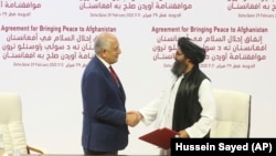 امضای توافقنامه صلح میان نمایندگان امریکا و طالبان در قطر