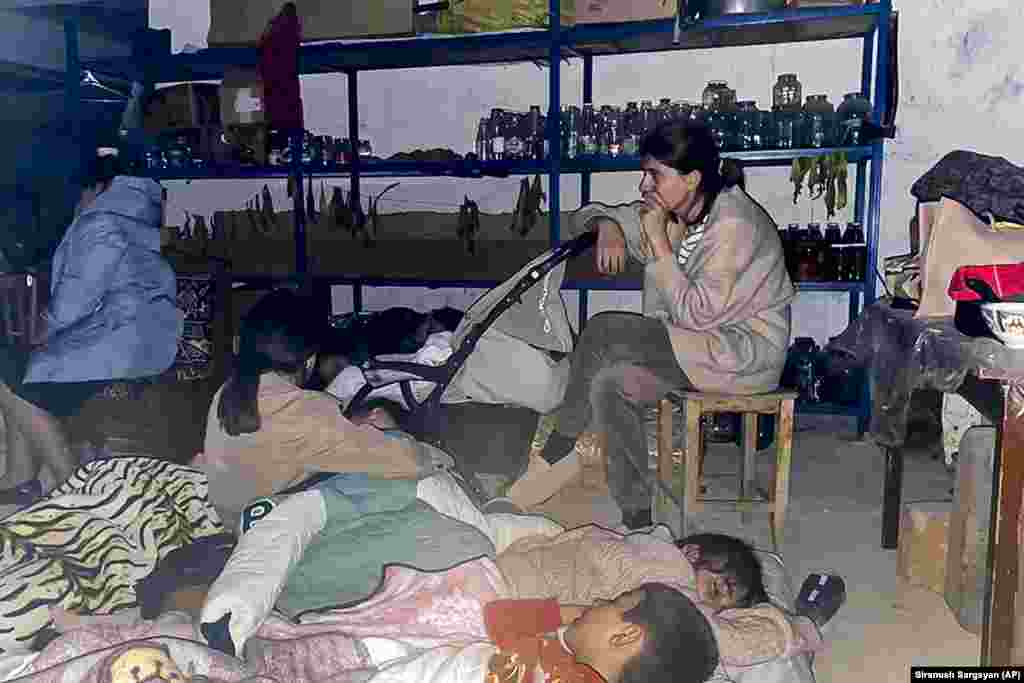 Children sleep in a shelter during shelling in Stepanakert. Azerbaijan’s Defense Ministry said on September 19 that "only legitimate military targets are being destroyed," and the Foreign Ministry said the only path to peace in the region was the complete withdrawal of Armenian forces from the territory. 