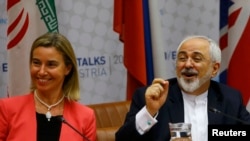 EU foreign policy chief Federica Mogherini and Iranian Foreign Minister Mohammad Javad Zarif make remarks to the press after news of the deal was revealed.