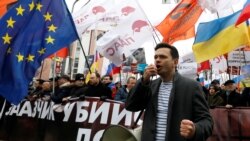 Russian opposition figure Ilya Yashin addresses supporters during a rally in Moscow on February 29.