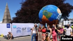 Stotine aktivista različitih organizacija za zaštitu životne sredine okupilo se u Falmouthu, tokom samita G7 u Cornwallu, 12. juna 2021.
