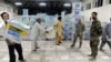 Kerry Meets Feuding Afghan Candidates