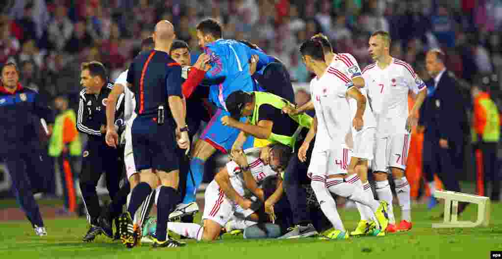 The scuffles grew more intense, and the local crowd reacted angrily... 