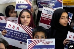 Afganistanske izbjeglice okupljaju se u Islamabadu nakon što je Washington 24. januara obustavio američki program za prijem izbjeglica.