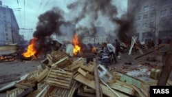 After a prolonged conflict between Russia's Congress of People's Deputies and President Boris Yeltsin, Yeltsin dissolved the legislature on September 21, 1993. Deputies refused to leave the parliament building and their supporters set up barricades in the streets.