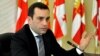 Georgian Defense Minister Irakli Alasania ruled out a military option with assisting Kyiv, but said that Georgia would offer "lessons learned" after its own war with Russia in 2008.