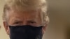 Трамп впервые за время эпидемии появился в маске на публике